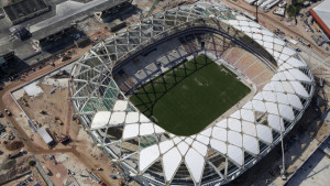 FILE - This Dec. 10, 2013 file photo shows an aerial view of the Arena da Amazonia stadium in Manaus, Brazil. A worker was injured in an accident outside this World Cup stadium, local organizers said Friday, Feb. 7, 2014. Organizers in charge of the stadium's construction said the worker was hurt while dismantling a crane that was used to install the roof. (AP Photo/Renata Brito, File)
