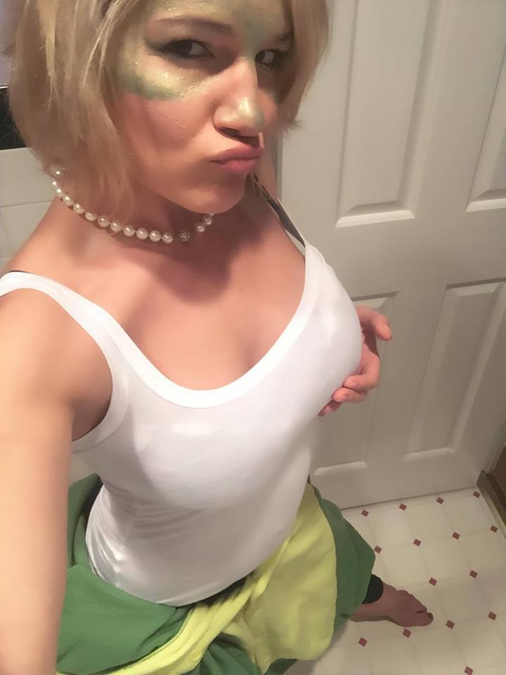 Felice Herrig playing aroud with stuffed breast