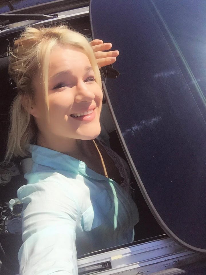 Felice Herrig through sun roof
